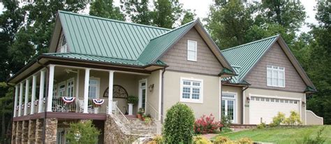 beige siding house with green metal roof|green roof shades.